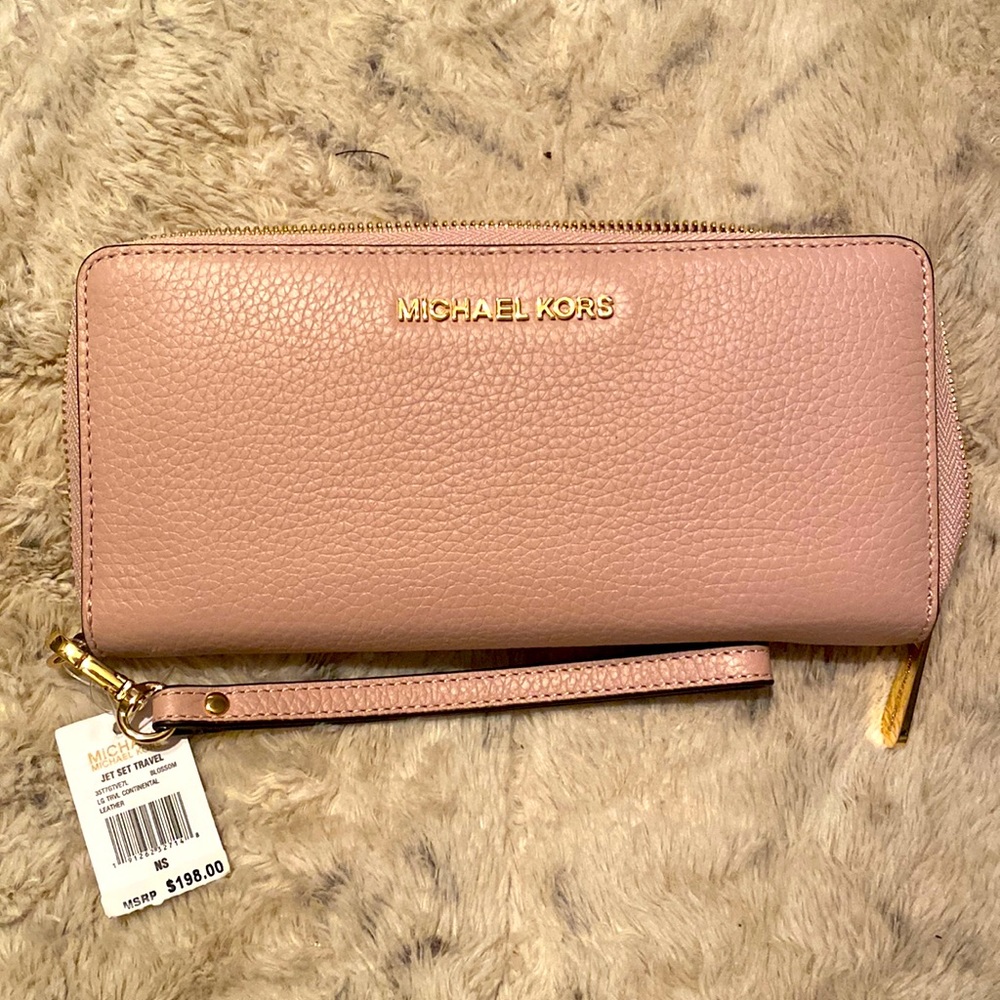 Michael Kors jet set travel wristlet in color blossom